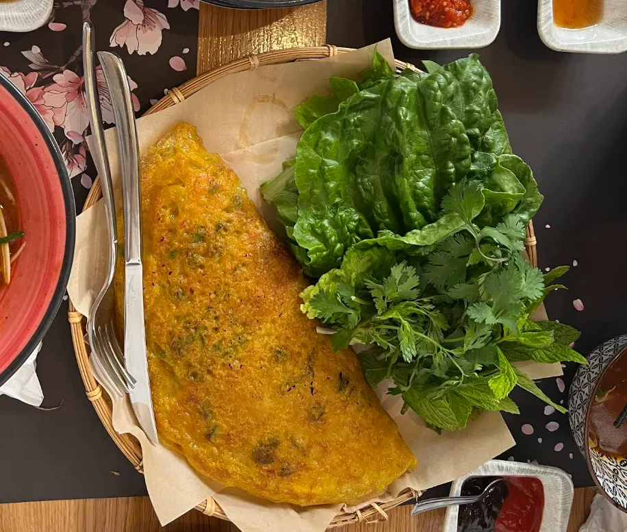 Bánh xèo with fresh lettuce