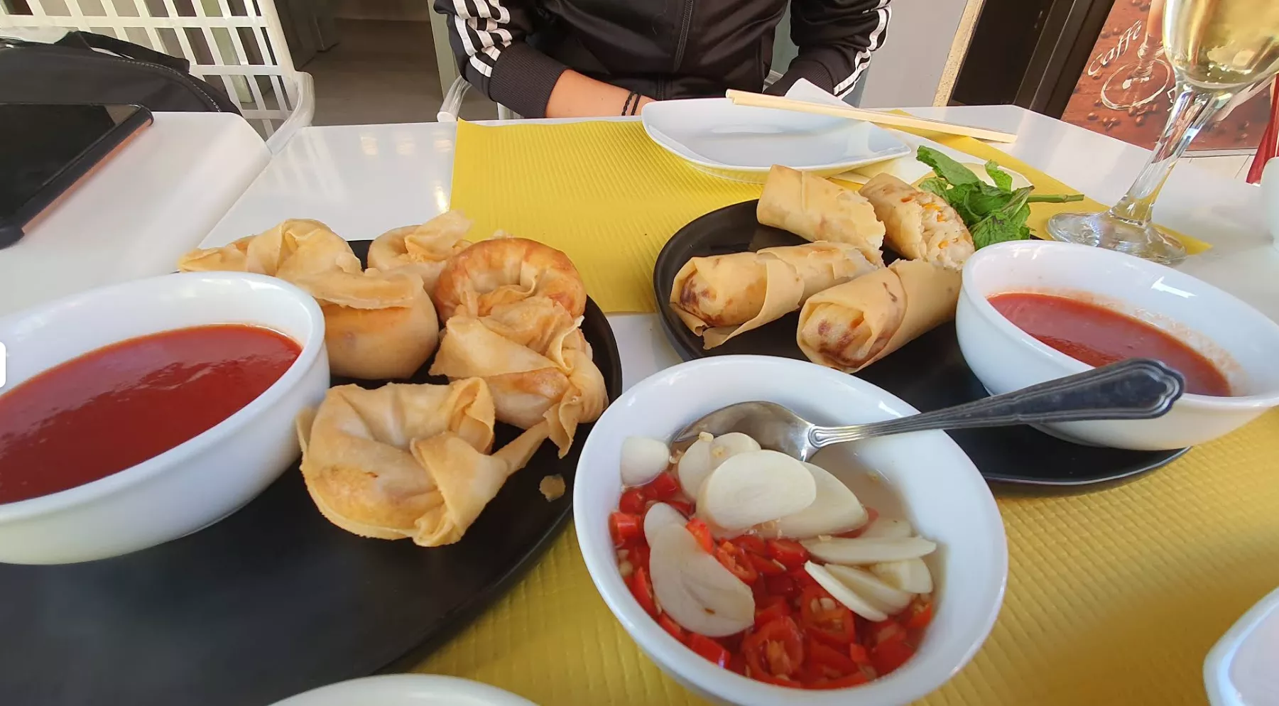 Crispy Vietnamese spring rolls and dipping sauces